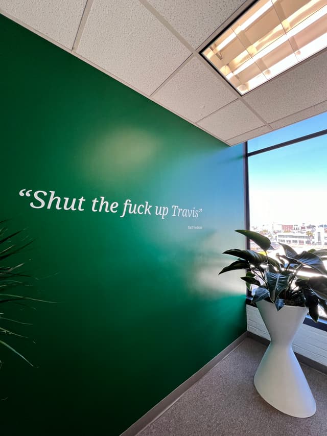 Tongue-in-cheek wall art referencing a famous Nat Friedman tweet
